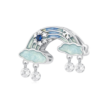 Silver charm with rainbow, clouds, and crystals on a white background