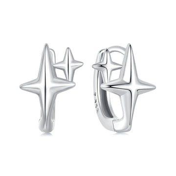 Silver star-shaped earrings on a white background
