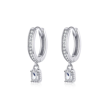 Silver hoop earrings with square drop charms on a white background
