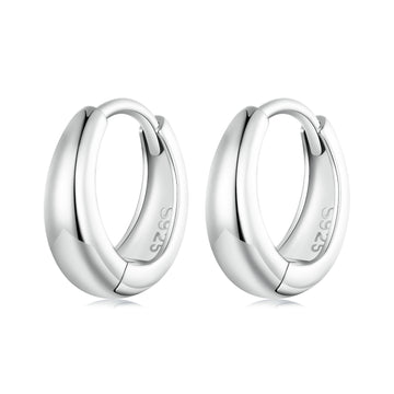 Pair of silver hoop earrings on a white background