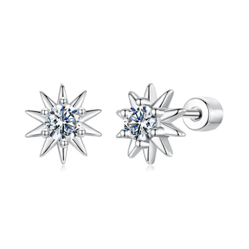 Star-shaped silver earrings with clear gemstones on a white background