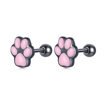 Pair of pink paw print earrings on a white background