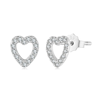 Heart-shaped silver earrings with clear stones on a white background
