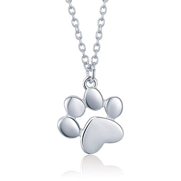 Silver paw print necklace on a white background