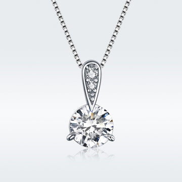 Diamond necklace on a light gray background