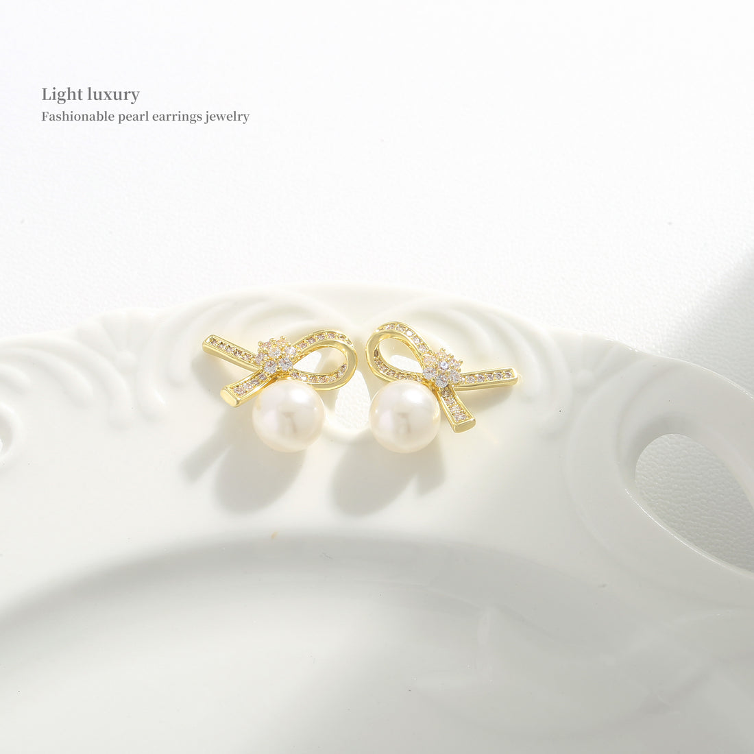 Golden Bow Pearl Studs