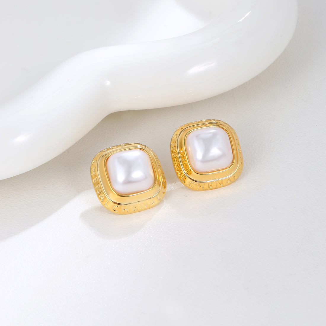 White Pearl Cushion Studs