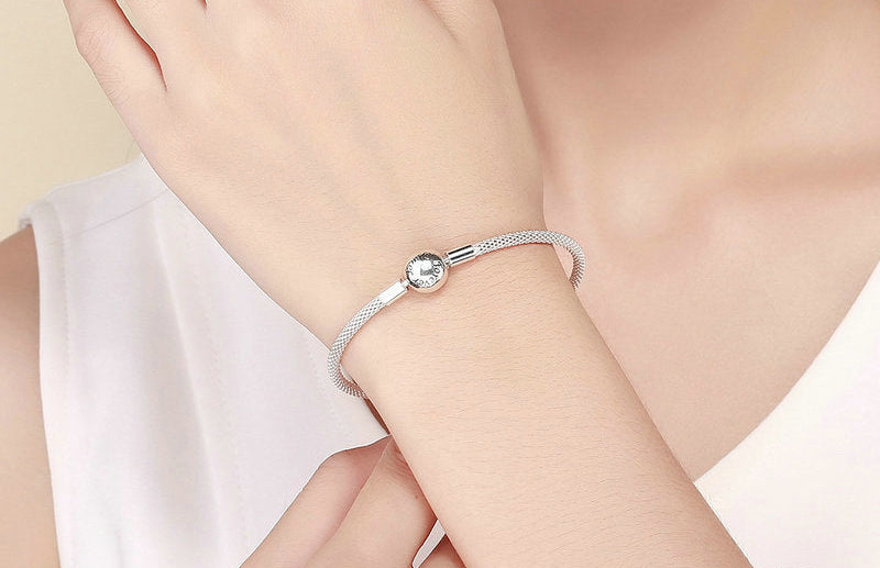Silver bracelet with a YIZIV logo on a white background
