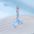 Blue starfish-shaped pendant on a light blue background