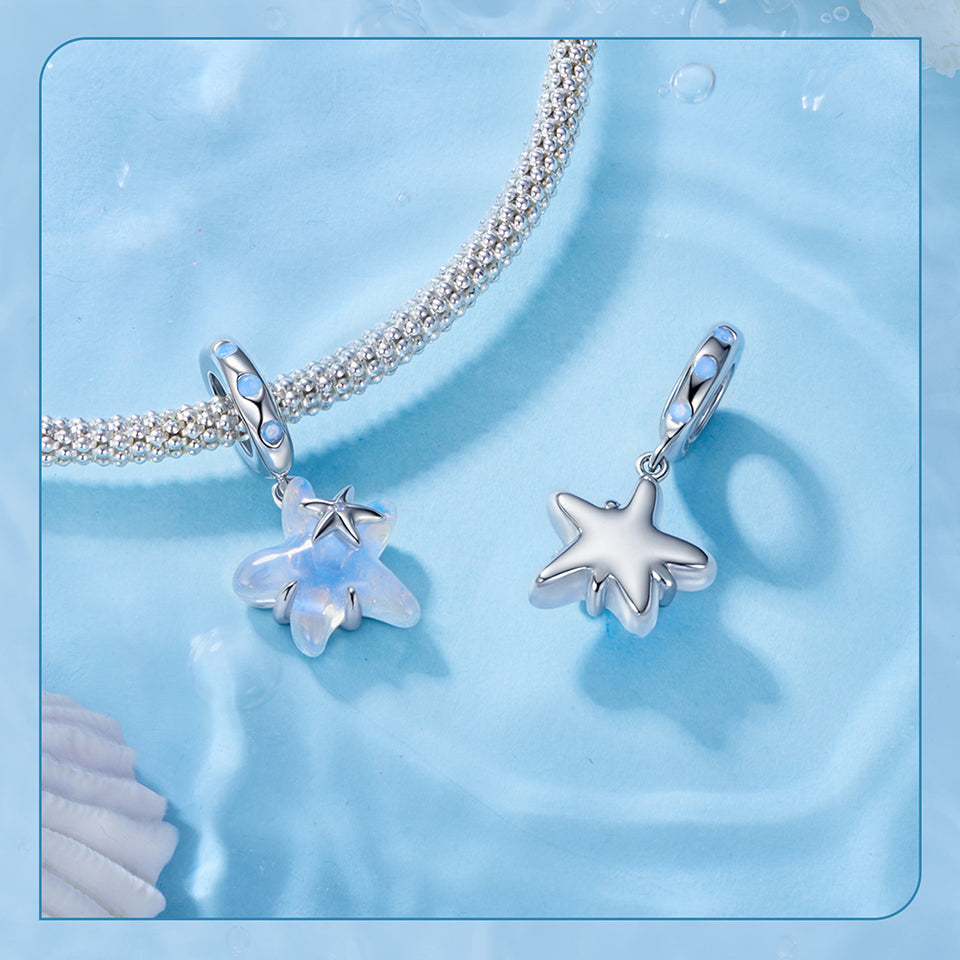 Blue starfish-shaped pendant on a light blue background