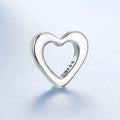 Silver heart-shaped pendant with '925' stamp on a light blue background