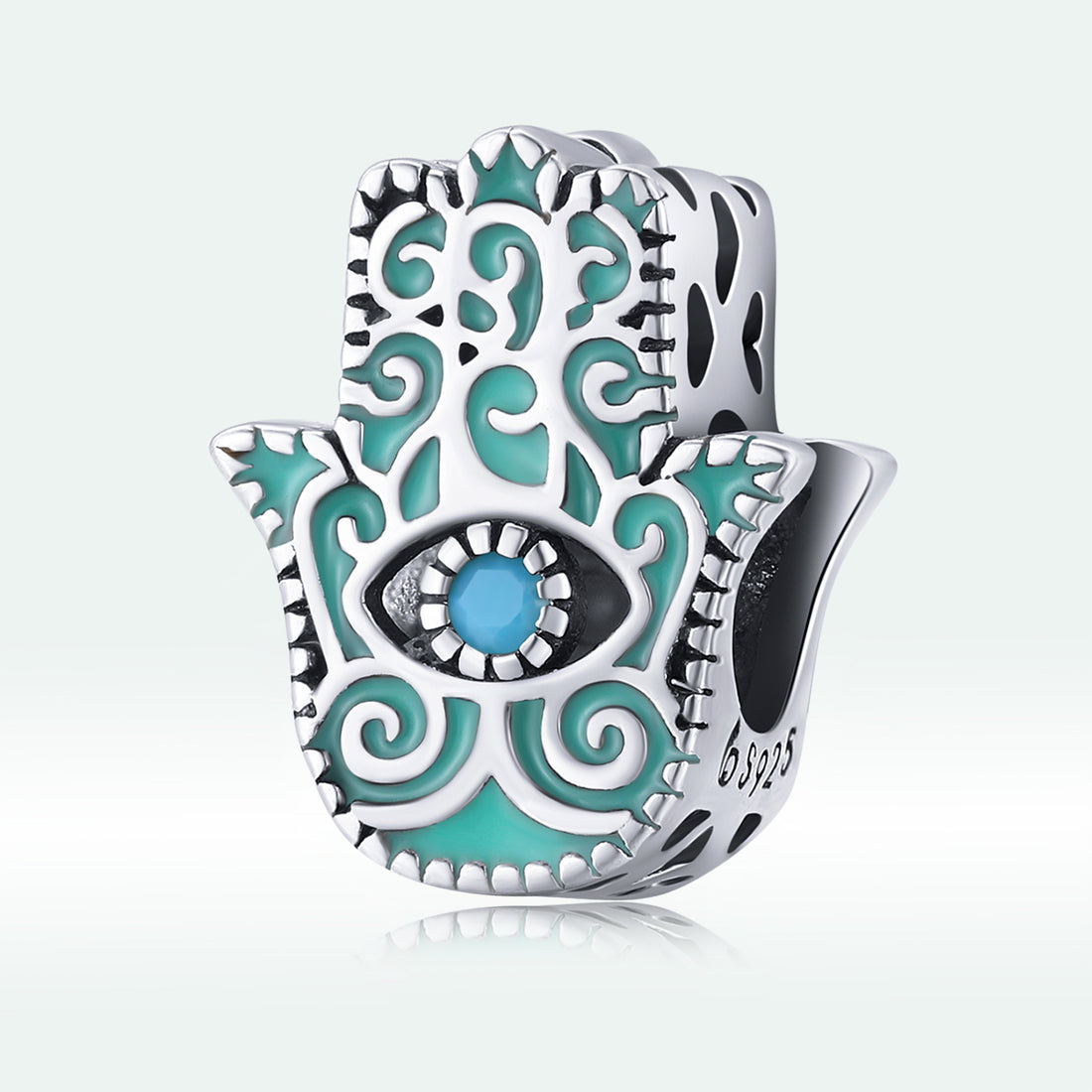 Silver and turquoise Hamsa hand charm with an eye design on a white background