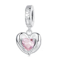 Silver heart-shaped charm with a pink gemstone on a white background