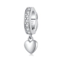 Silver charm with heart detail and clear stones on a white background
