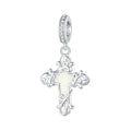Silver cross pendant with a white center on a white background
