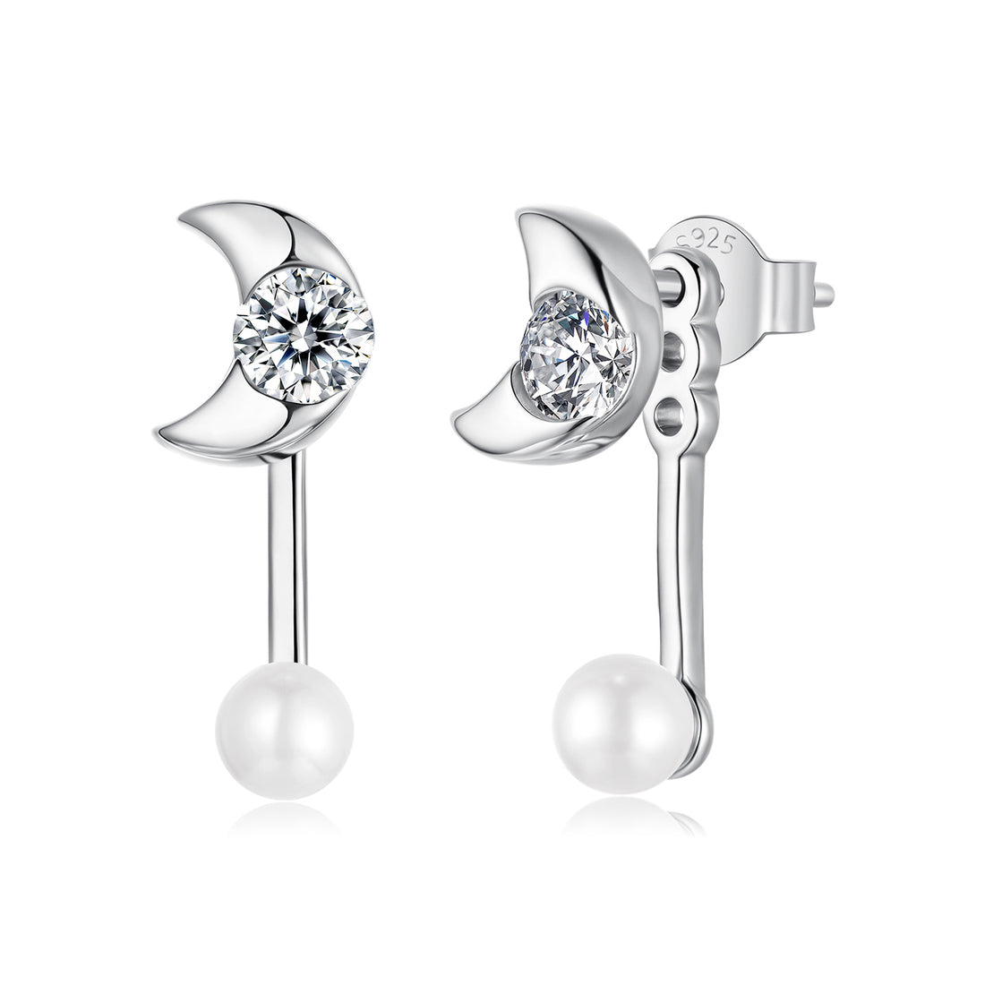 Silver moon-shaped earrings with clear gemstones and pearls on a white background