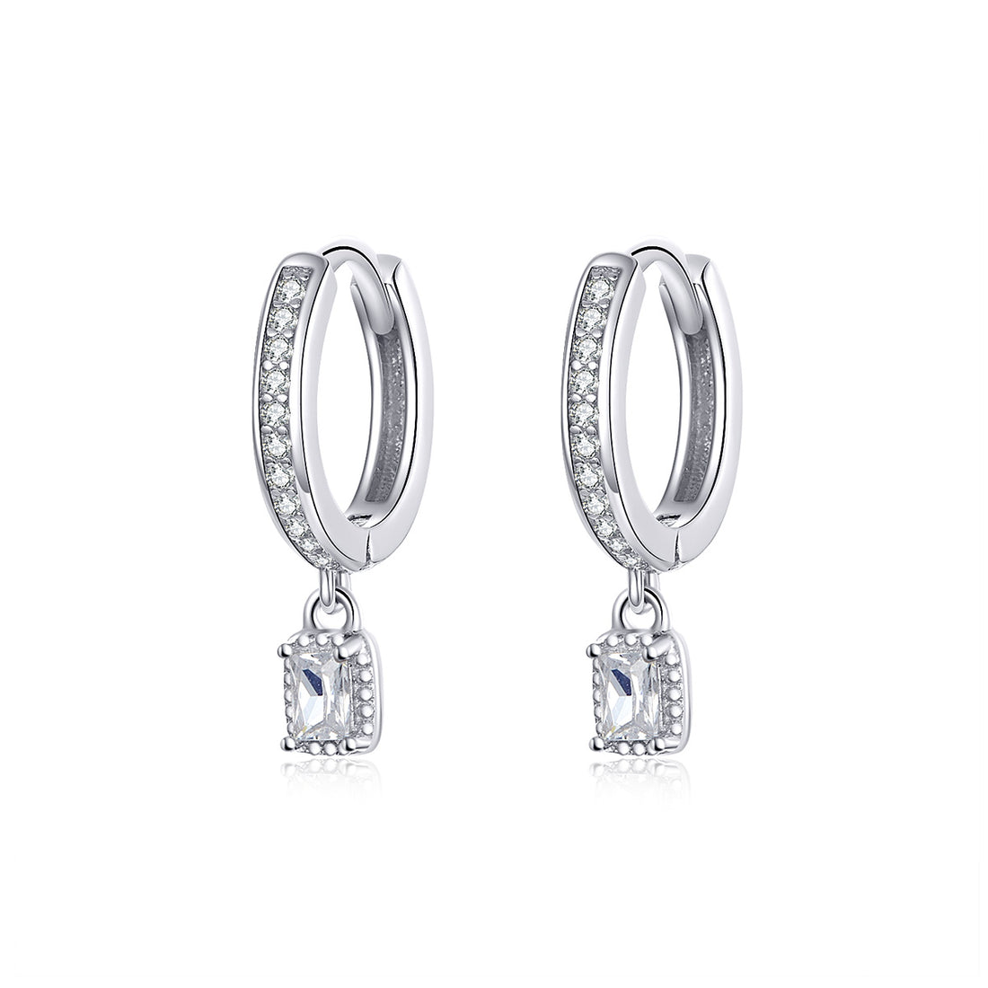 Silver hoop earrings with square drop charms on a white background