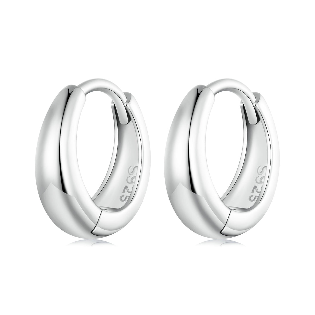 Pair of silver hoop earrings on a white background