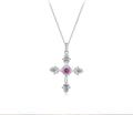 Silver cross necklace with a pink gemstone on a white background, featuring the text 'As Unique As You'.