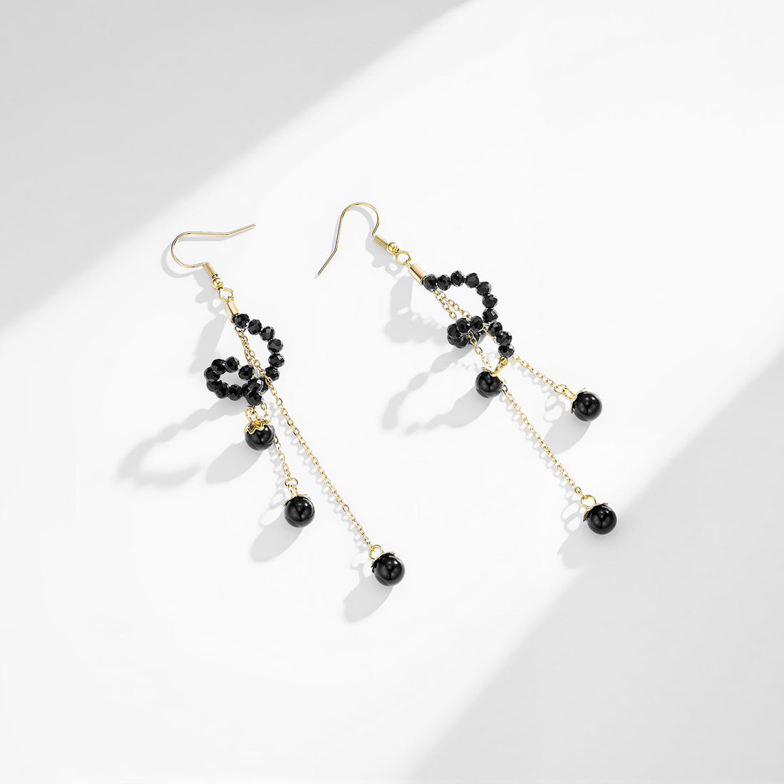 Black Beaded Spiral Dangle Earrings