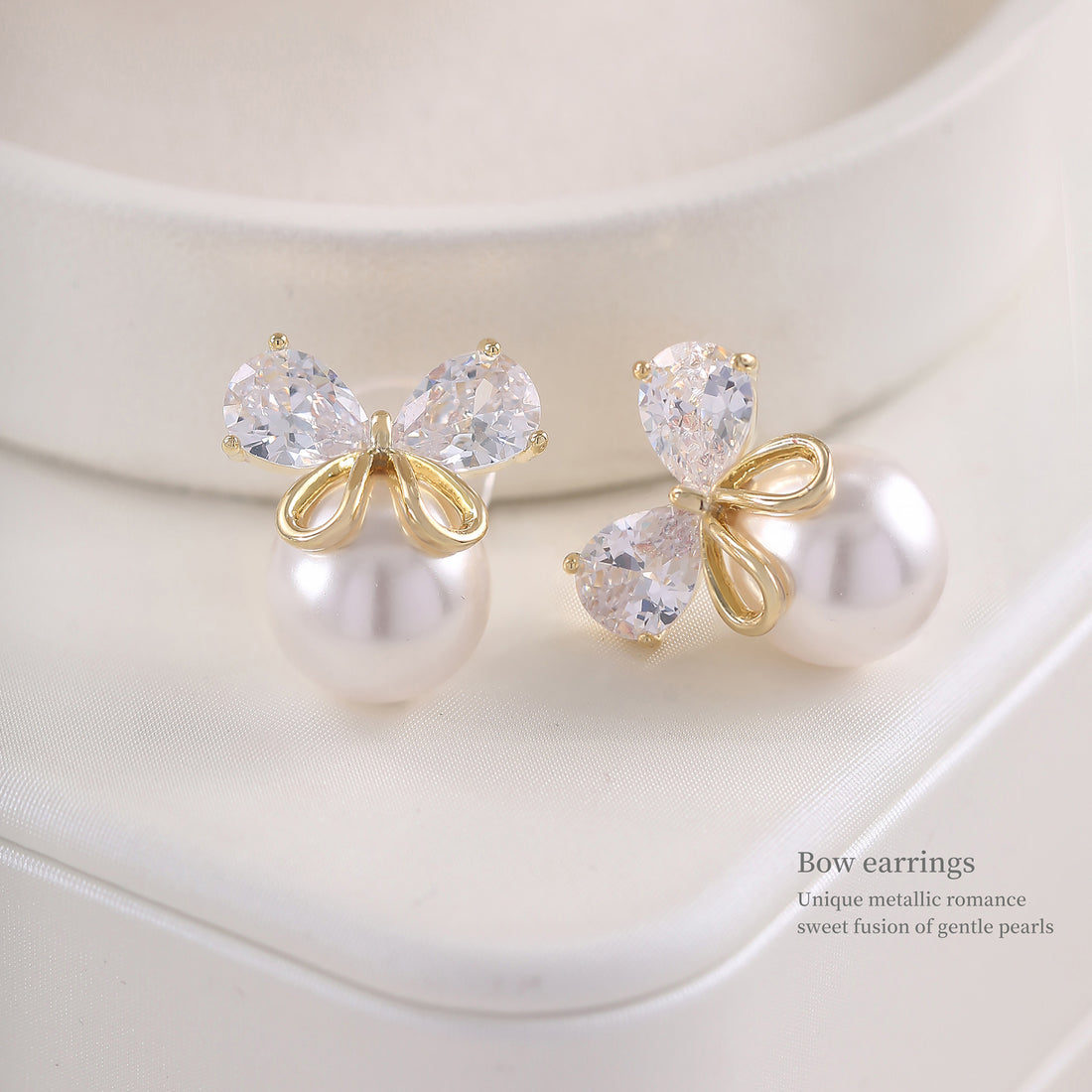 Bow Curve Huggie Hoops