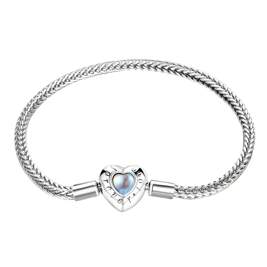 Silver bracelet with heart-shaped clasp on a white background, featuring YIZIV branding.