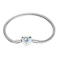 Silver bracelet with heart-shaped clasp on a white background, featuring YIZIV branding.