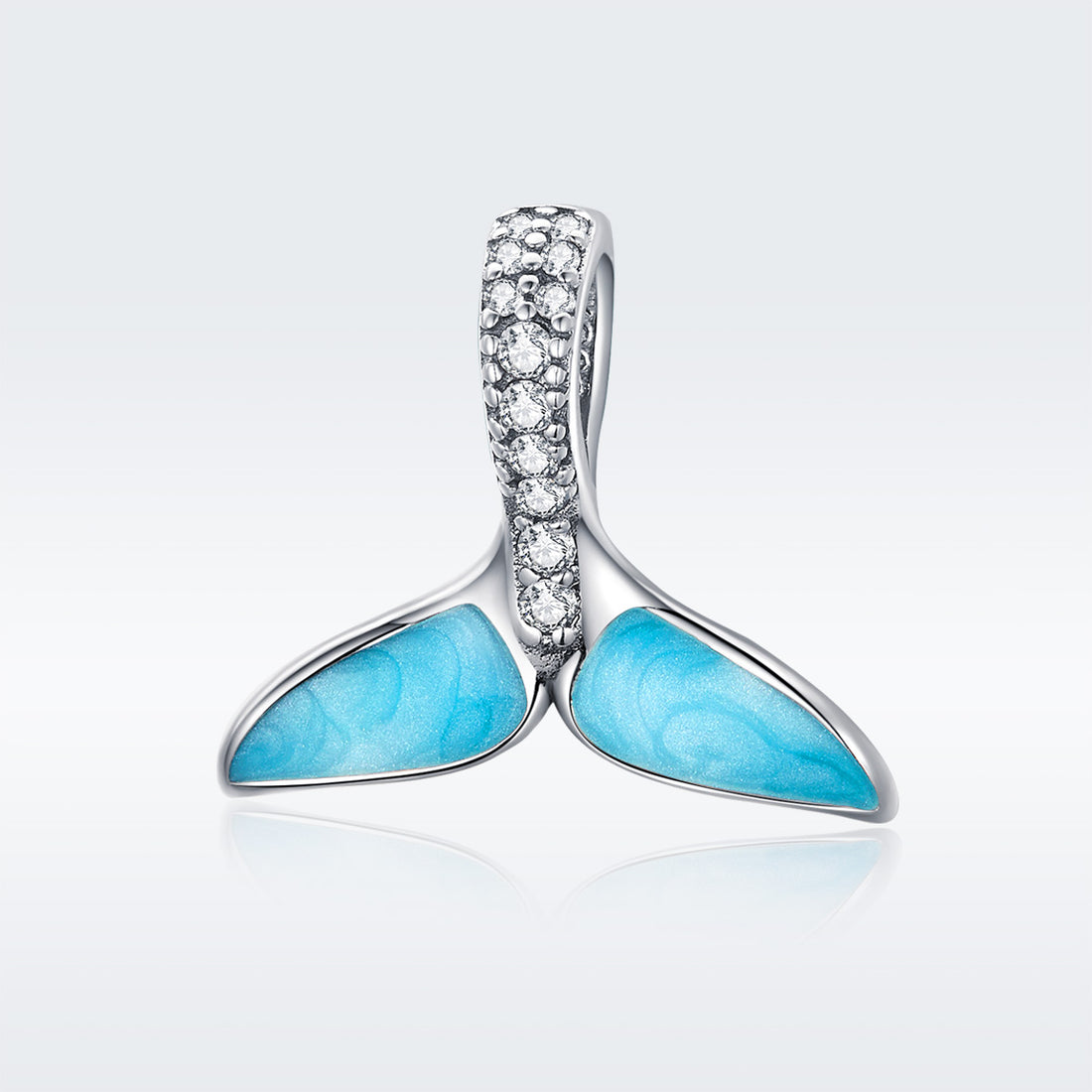 Jewelry pendant with turquoise stones and diamond accents on a white background