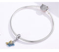 Silver bracelet with charms on a white background