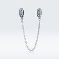 Safety chain with intricate designs on a light Gray background