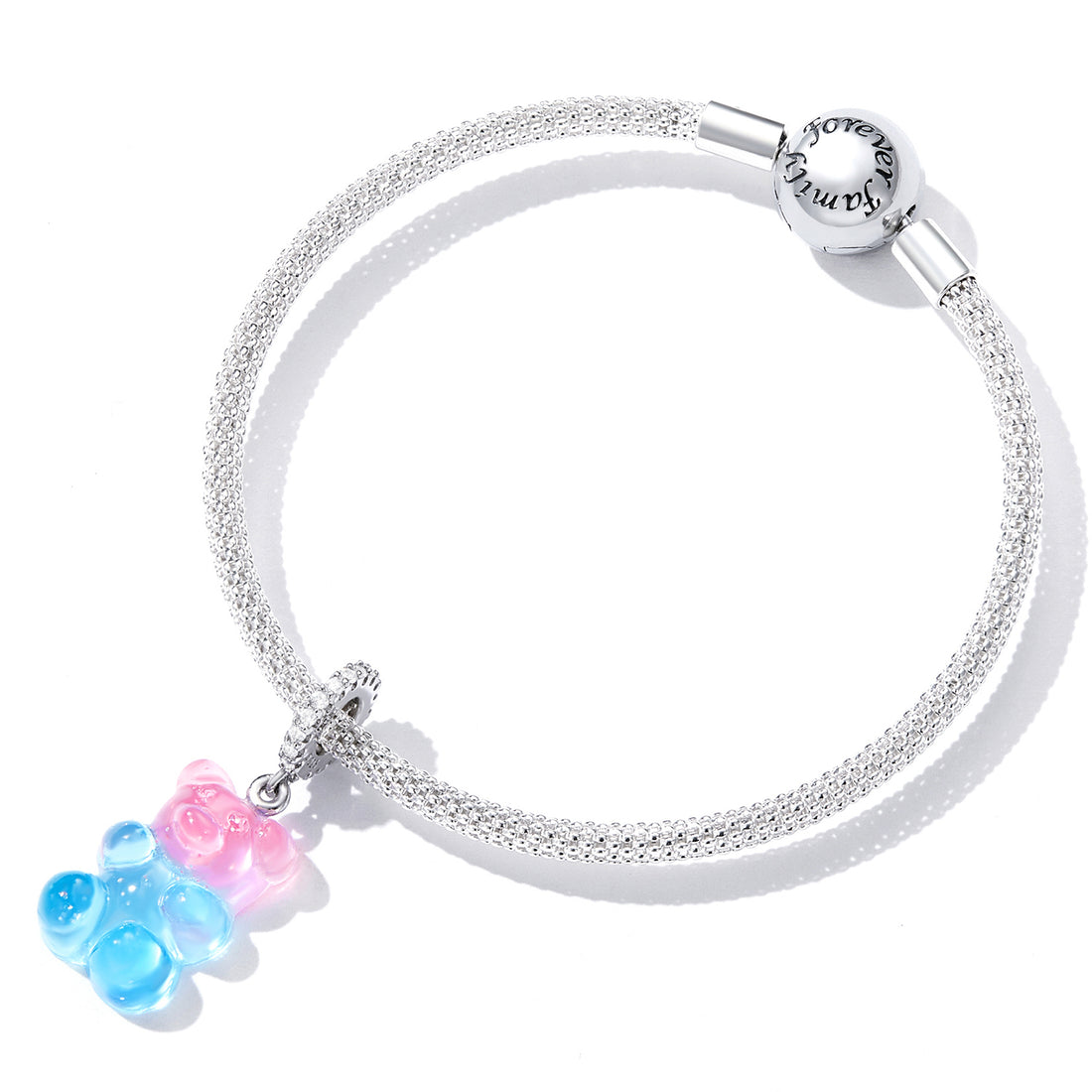 Gummy bear-shaped pendant with pink top and blue bottom on a white background