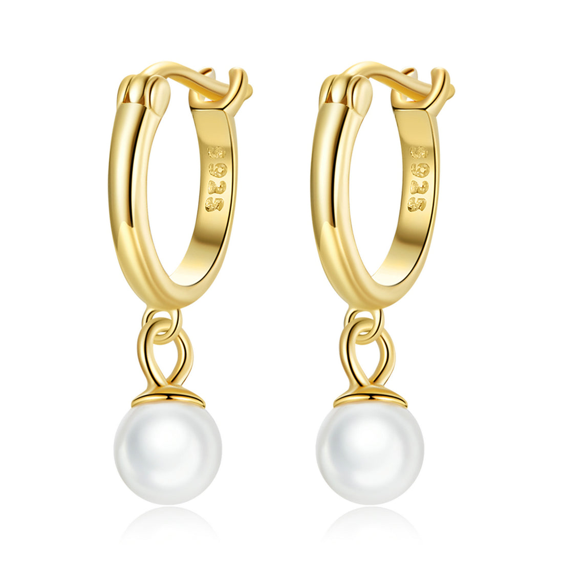 Gold hoop earrings with pearl drops on a white background