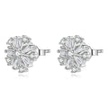 Pair of silver earrings with clear gemstones on a white background