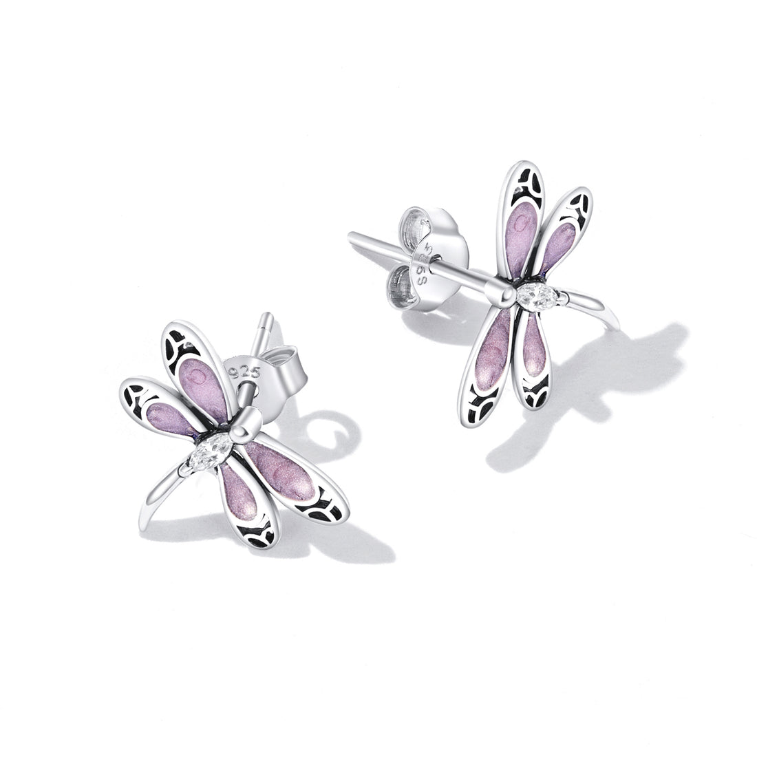 Pair of dragonfly-shaped earrings with pink and silver design on a white background