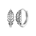 Silver leaf-shaped hoop earrings on a white background
