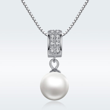 Pearl necklace with diamond pendant on a white background