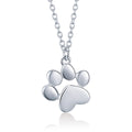 Silver paw print necklace on a white background